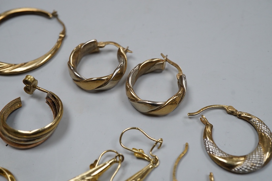 Nine pairs of earrings, comprising: seven hoop earrings, two of which set with pastes; and two pairs of drop earrings, six with British hallmarks for 9ct gold combined gross weight approximately 18 grams, three variously